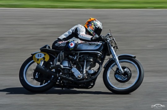 Maria Costello MBE competes in the Barry Sheene Memorial Trophy at the Goodwood Revival onboard the George Cohen Norton Daytona Manx. Image courtesy of Scott Chalmers Photography.